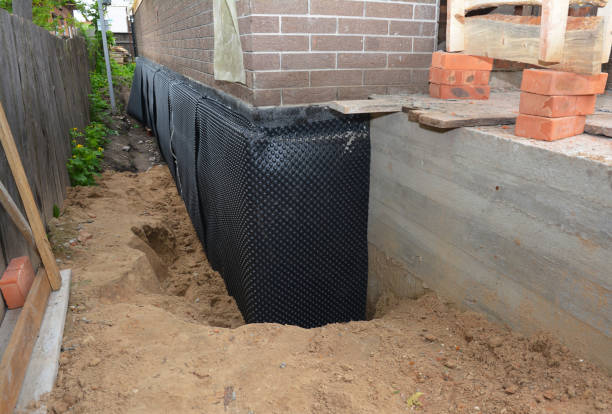 Happy homeowners after waterproofing job in Beaverdam